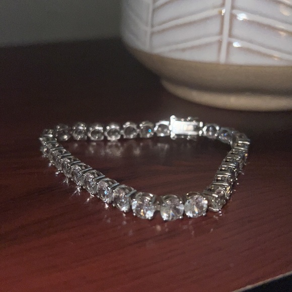 Sterling Silver Lab created sapphire tennis bracelet. - Picture 5 of 6